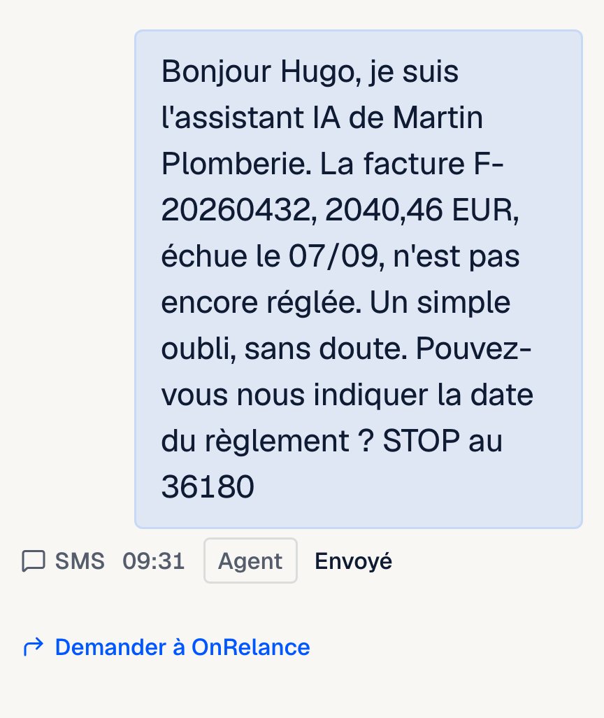 Le SMS envoyé par l'assistant de Martin Plomberie : la facture, son montant, son échéance, et une demande de date de règlement